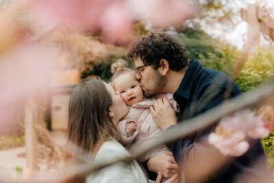 Lifestyle family photography showing a family interacting naturally, captured in soft light and a timeless style.